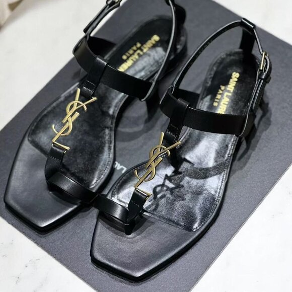 NIB Saint Laurent Black & Gold Cassandra Flat Sandals